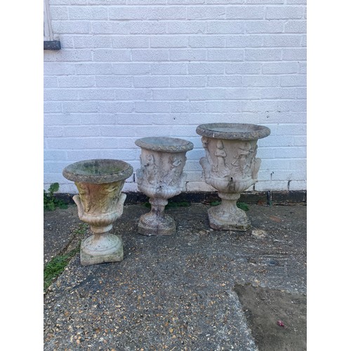 359 - Three classical style garden urns -