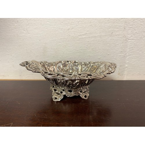 24 - A late Victorian silver bon-bon dish, London 1894, with floral and pierced sides -