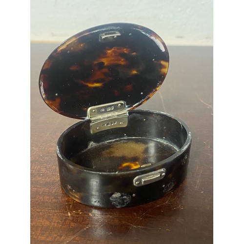 47A - A late Victorian silver mounted tortoiseshell box, London 1900, oval and with push button and 'C' sc... 