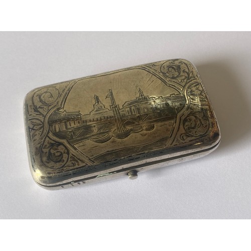 57 - A Russian silver and niello snuff/tobacco box, the top decorated with a landscape scene -