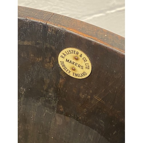 392 - A coopered oak jardinière, labelled for R A Lister & Co -