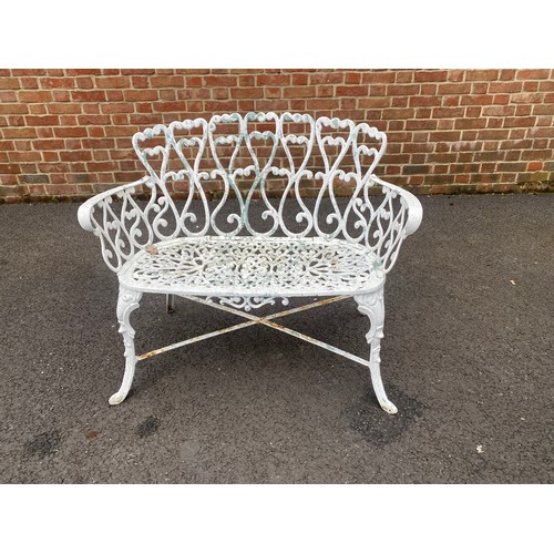 463 - A cast metal garden bench -