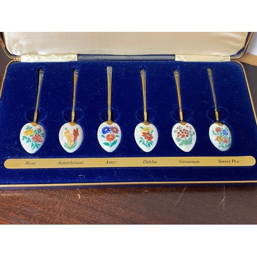 85 - A cased set of six limited edition silver gilt spoons, Birmingham 1978, each with floral decorated e... 