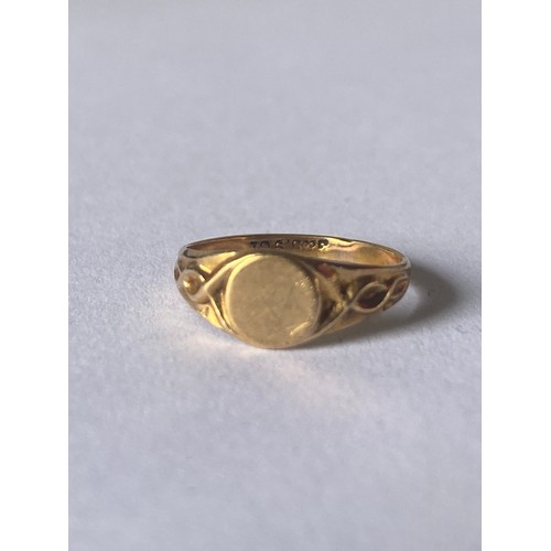 2 - A 9ct gold child's ring -