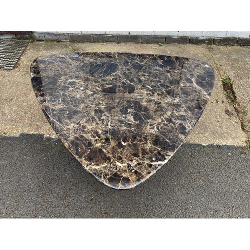 330 - A marble coffee table, with triangular top -