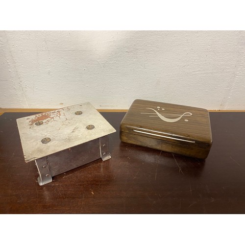 81 - An Arts & Crafts spot hammered silver plated box and a silver inlaid box -