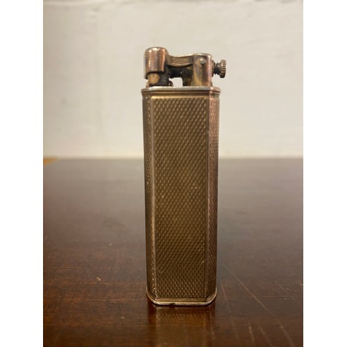 40 - A silver gilt Dunhill lighter, signed Dunhill Paris -