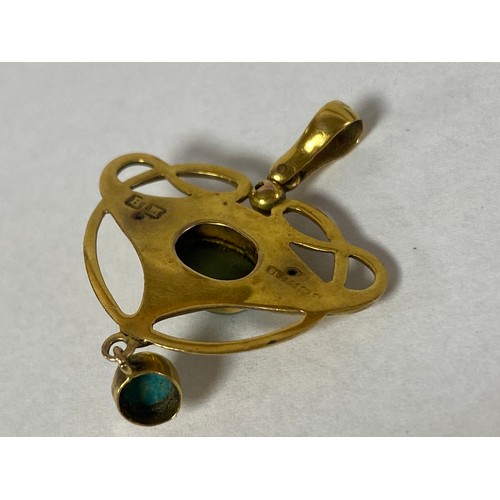 65 - An Edwardian 9ct gold openwork pendant, set with turquoise cabochon and suspending a turquoise drop,... 