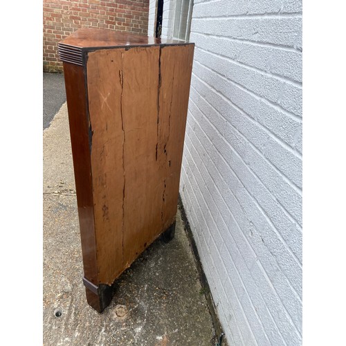 343 - A George III mahogany and inlaid corner cupboard -