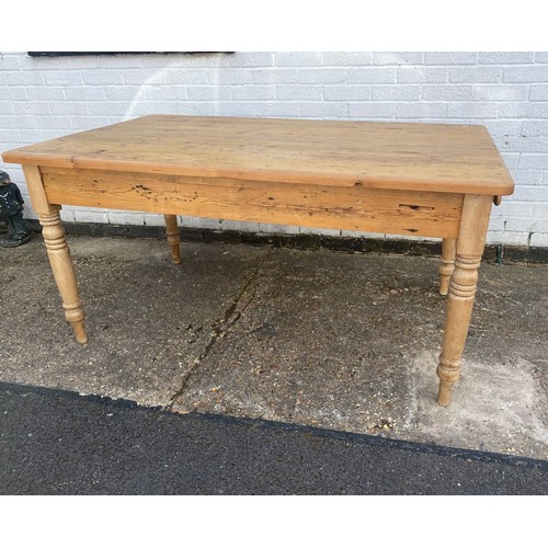 361 - A reclaimed pine farmhouse kitchen table, with two end drawers and turned legs -