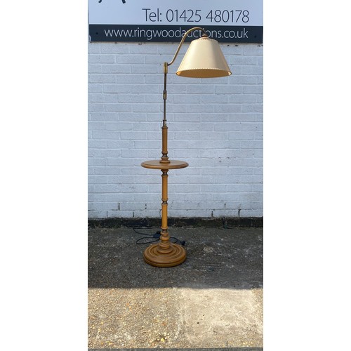 384 - A standard lamp, with swivel arms -