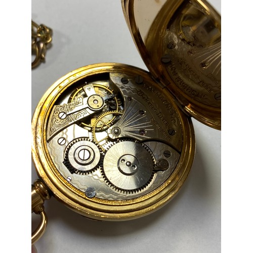 58 - An early 20th century rolled gold open face presentation pocket watch, case by Dennison, with associ... 