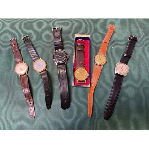 16 - A group of wristwatches -