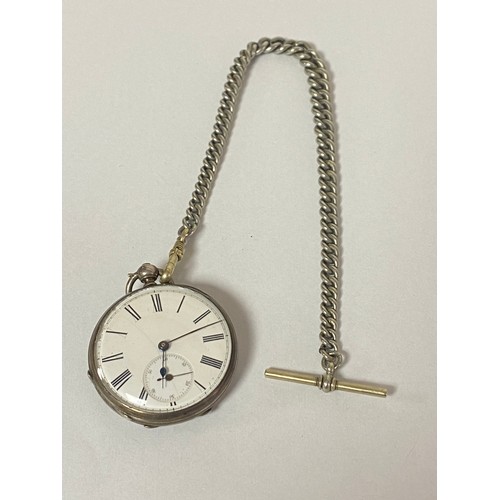 18 - A silver cased open face pocket watch, with watch chain -