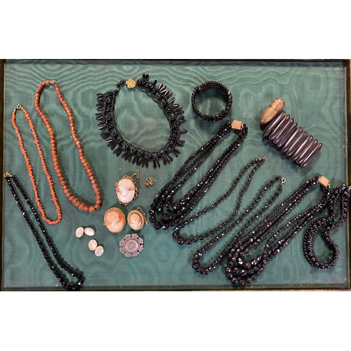 77 - A quantity of antique jewellery items, including shell cameo brooches, mourning jewellery, silver ae... 