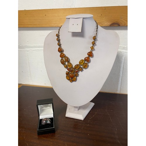 74 - A quantity of silver and other jewellery items, including silver and amber pendant necklace -