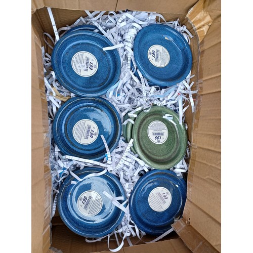 411 - A quantity of blue/green glazed saucers -