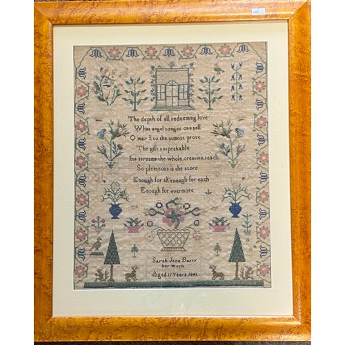 85 - A Victorian sampler, worked with birds, trees and animals around a central verse, worked by Sarah Ja... 