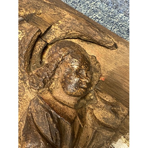 83 - An antique carved and painted ecclesiastical panel, carved with a pair of angels and gothic tracery ... 