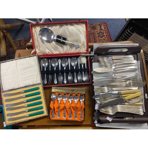 67 - A quantity of plated flatware, some cased -