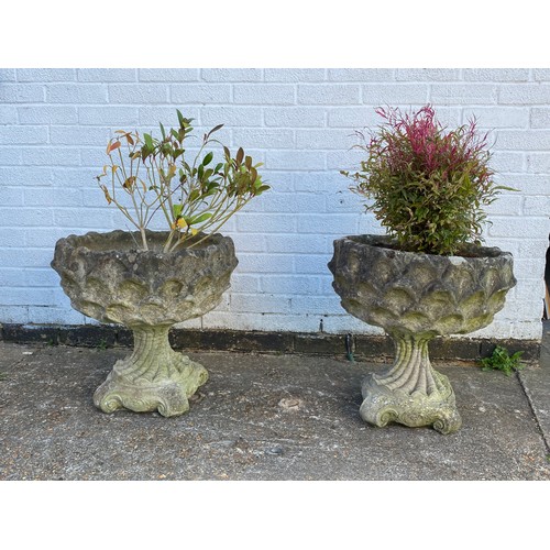 450 - A pair of garden planters, with shell decoration -