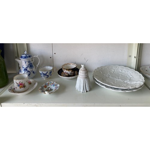 77 - A group of Meissen china, including coffee can and saucer decorated with flowers, cup and saucer dec... 