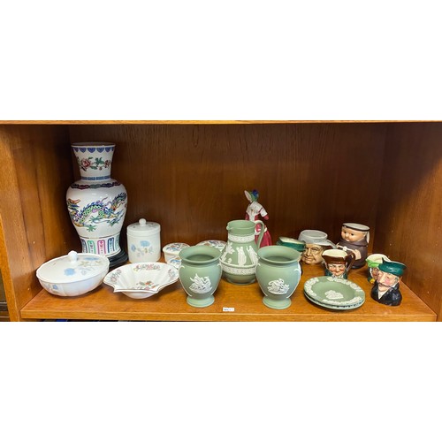 81 - A group of decorative china items, including Wedgwood green jasper jug and vases, Royal Doulton figu... 