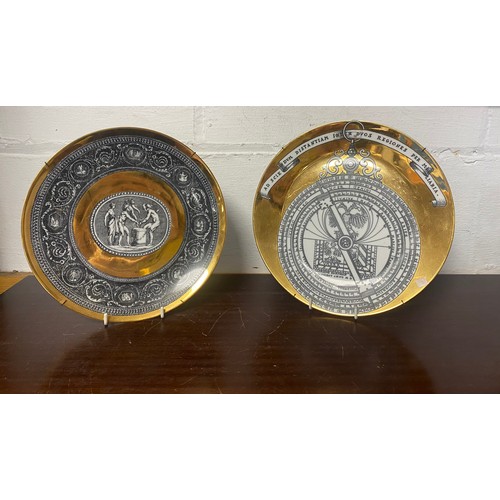 94 - A Fornasetti Astrolabio plate, together with a Fornasetti Commei plate -