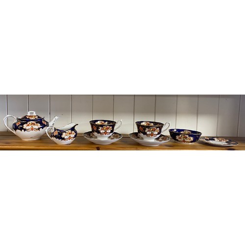 102 - A Royal Albert bachelors teaset, each piece decorated with Imari pattern -