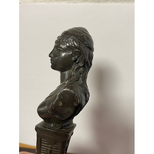 53 - A bronze bust of a lady, mounted on brass base -