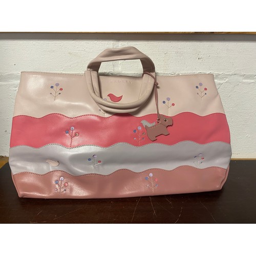 137 - A Radley 'Summer' handbag, pink and applied decoration, with dog bag charm -