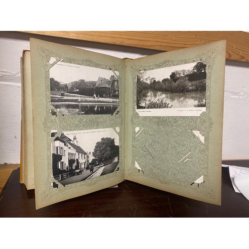 138 - Postcards: an olivewood faced postcard album, containing approximately 188 postcards, to include top... 