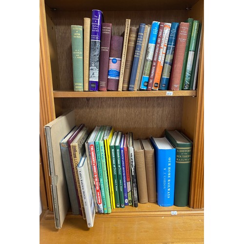 125 - Two shelves of books of railway interest -