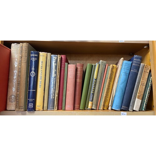 128 - A shelf of books of sporting interest, to include athletics, fencing and football -