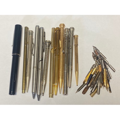 151 - A quantity of propelling pencils, pens and replacement nibs -