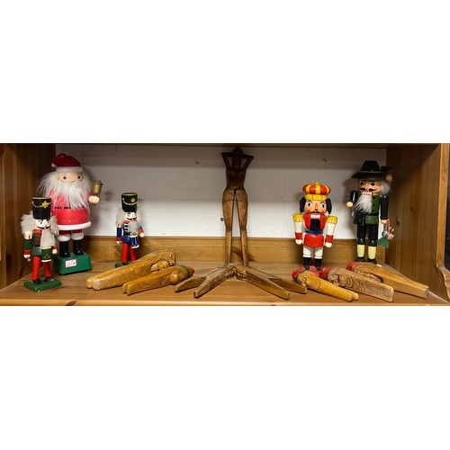 167 - A quantity of carved wood and other novelty nutcrackers -
