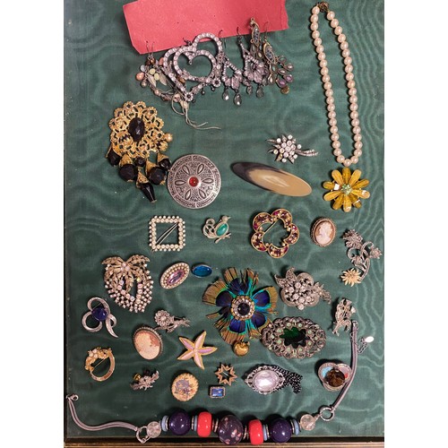 14 - A quantity of costume jewellery, silver brooch etc -