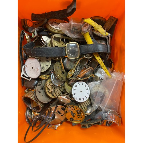 22 - A quantity of watch movements, dials etc -