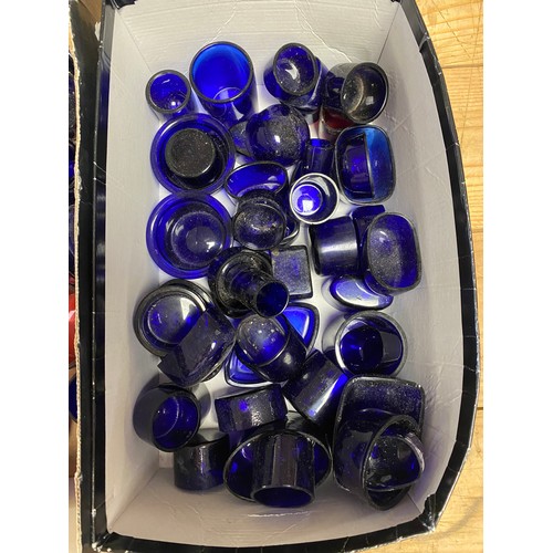 24 - A quantity of blue glass cruet and other liners -