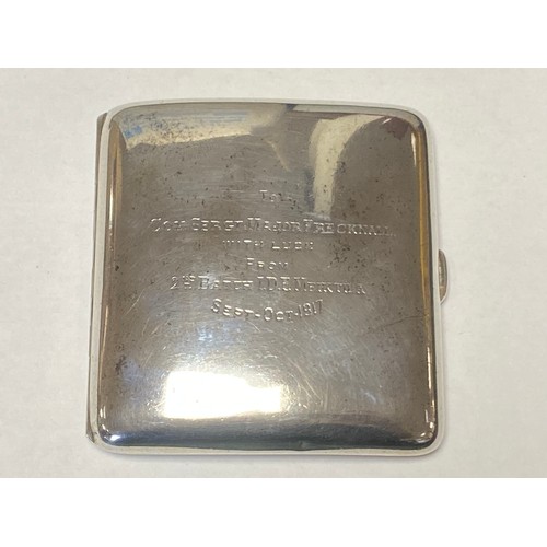 39 - A George V silver cigarette case, Birmingham 1916, with military presentation inscription, dated 191... 