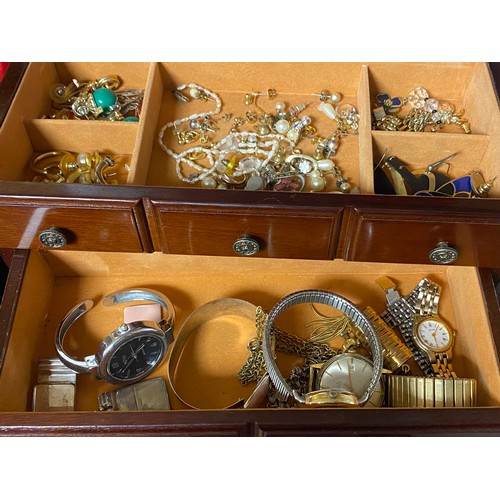 41 - Two jewellery boxes and contents, to include silver bangle and chains, filigree bracelet, watches, c... 