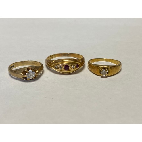 44 - An 18ct gold gem set ring, an 18ct gold diamond set ring and a 9ct ring (3) -