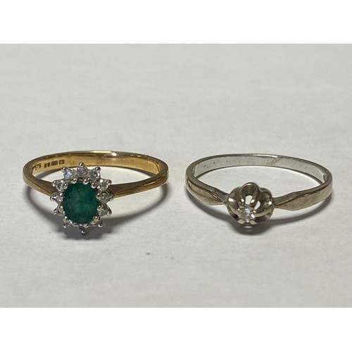 47 - A diamond single stone ring, set in white metal mount, stamped 585, and a 9ct emerald cluster ring (... 