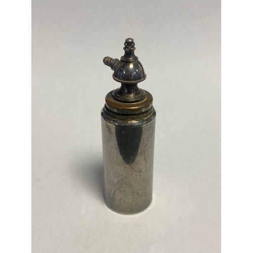 43 - A novelty silver bottle, the cover with kettle finial -