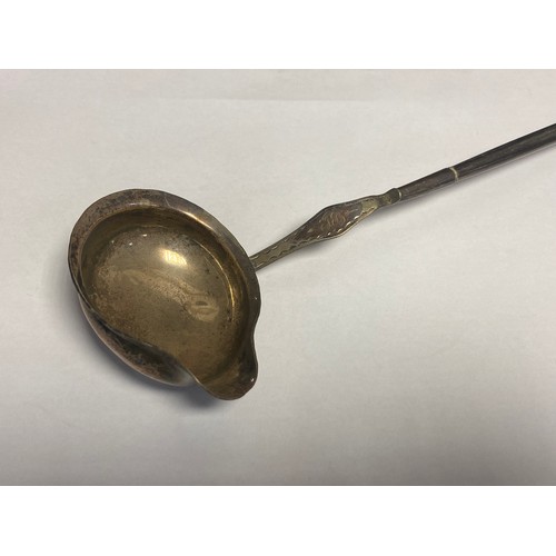 44 - A Georgian silver toddy ladle, with turned balleen handle -