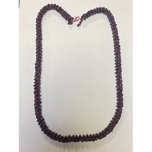 49 - A garnet bead necklace (a/f) -