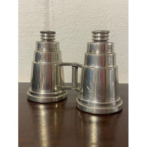 136 - A pair of aluminium travelling drink containers in the shape of binoculars -