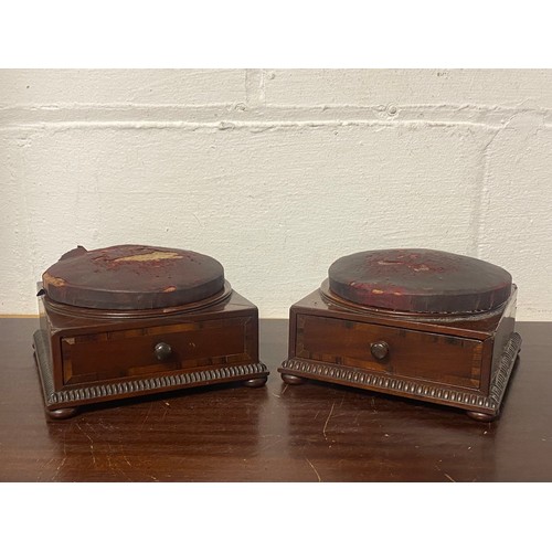 137 - A pair of Georgian mahogany and crossbanded pin cushions, each with circular cushion over single dra... 