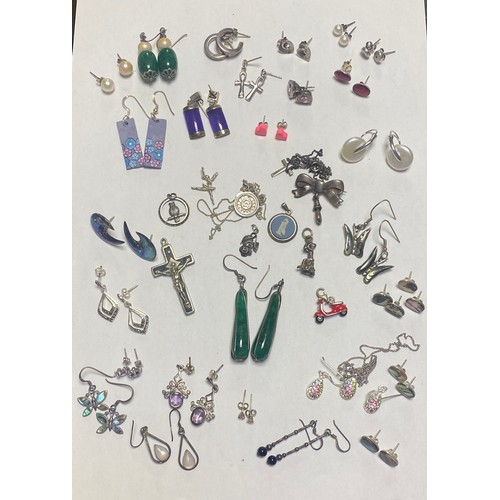 64 - A group of mostly silver jewellery, including approximately 30 pairs of earrings, some stone set, pe... 