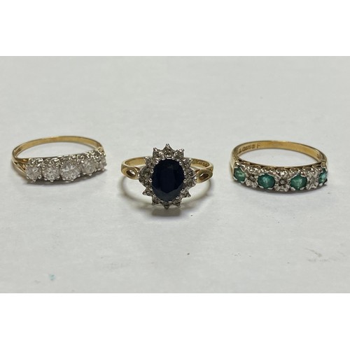 105 - Three 9ct gold rings, comprising a sapphire and diamond cluster, an emerald and diamond half eternit... 